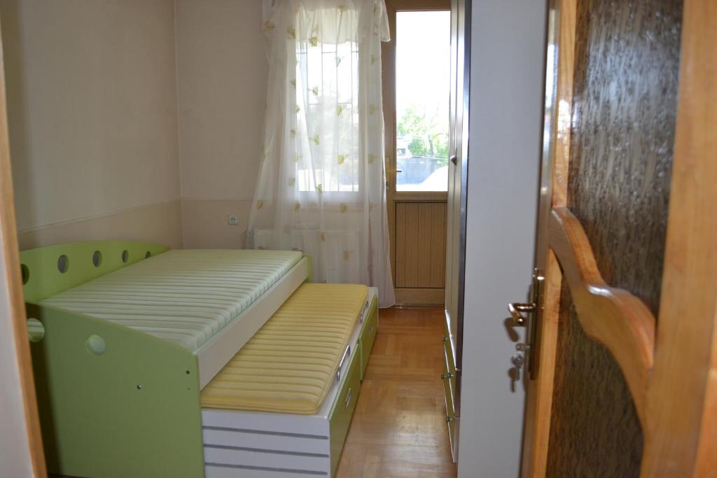 Postel nebo postele na pokoji v ubytování Royal Telavi