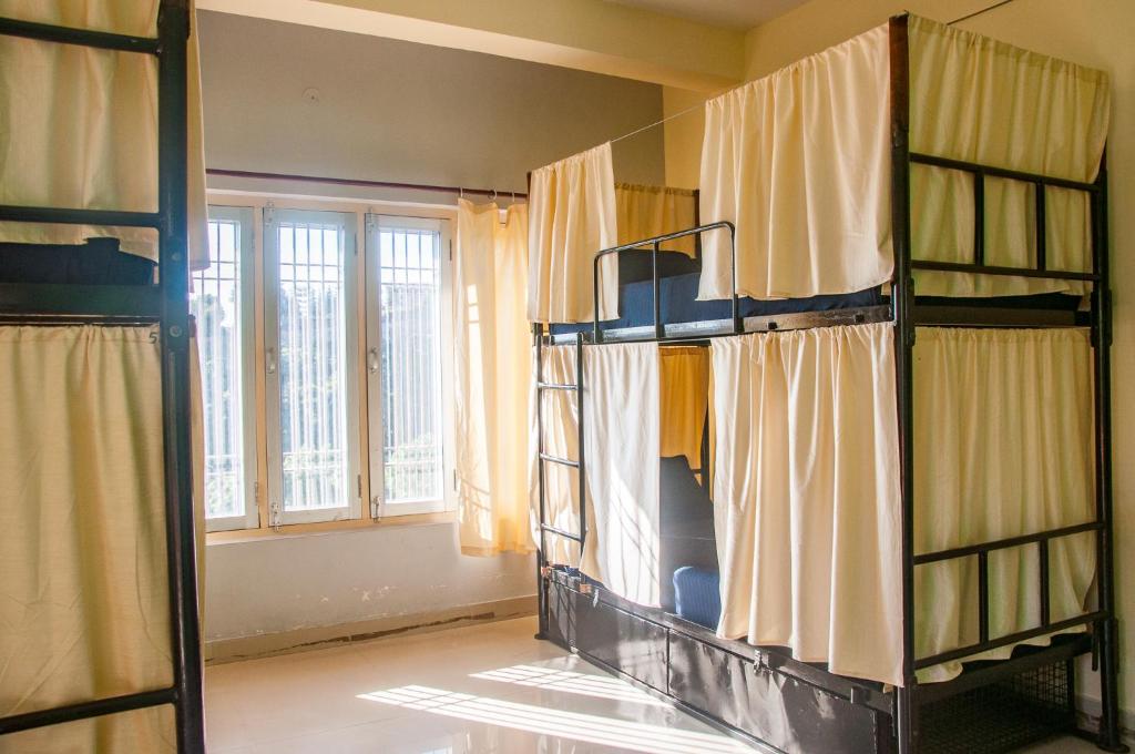 Postel nebo postele na pokoji v ubytování Hobo Hostel