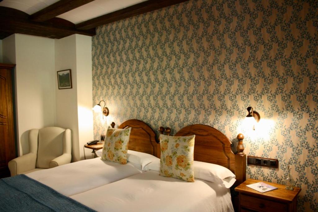Postel nebo postele na pokoji v ubytování Hotel Casa Arcas
