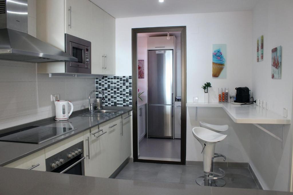 Kuchyňa alebo kuchynka v ubytovaní Penthouse Patio de doña Julia