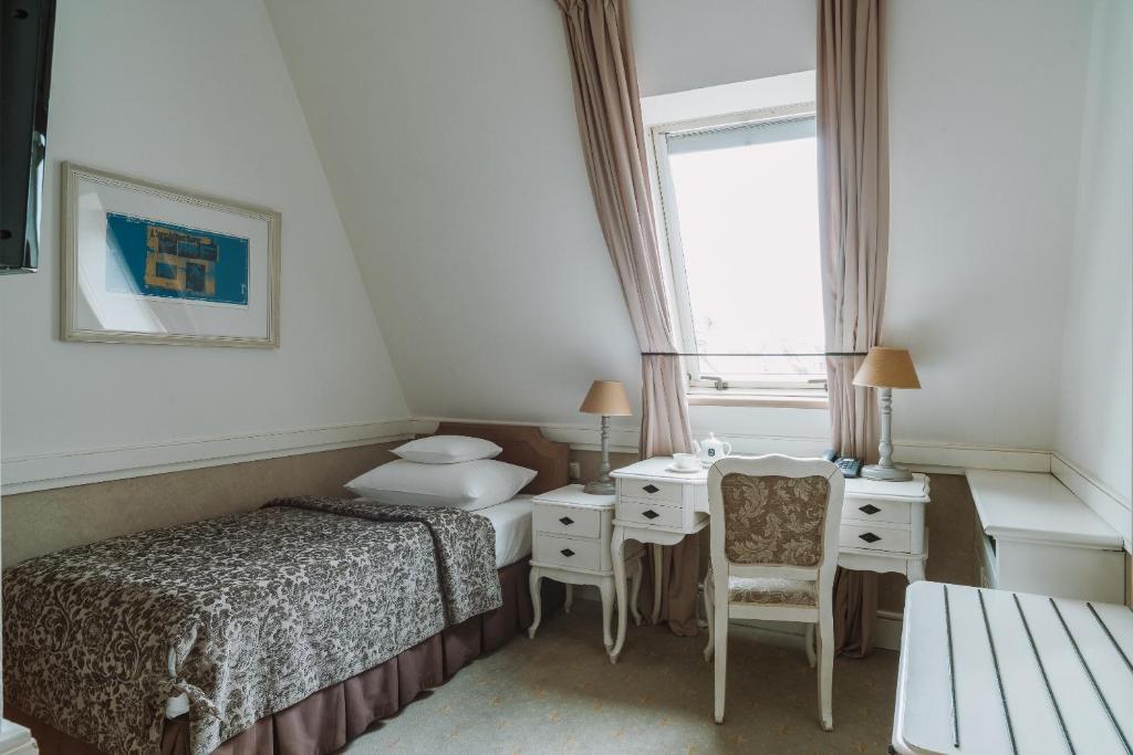 Posteľ alebo postele v izbe v ubytovaní Art Hotel