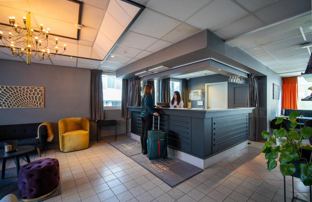 Posezení v ubytování Enter Amalie Hotel