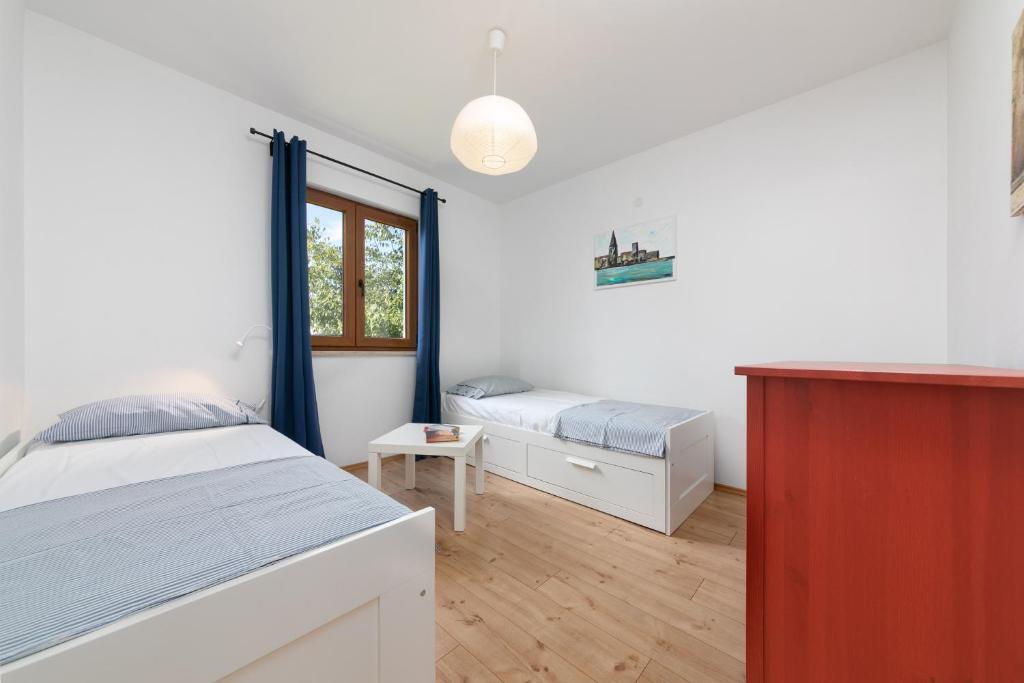 Postel nebo postele na pokoji v ubytování Grebac