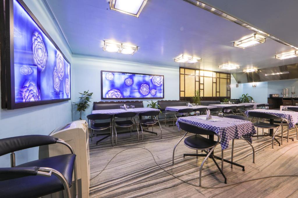 Posezení v ubytování Bharat Hotel