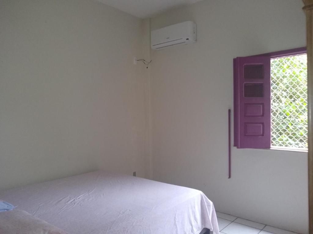 Postel nebo postele na pokoji v ubytování Residencial Ravasco