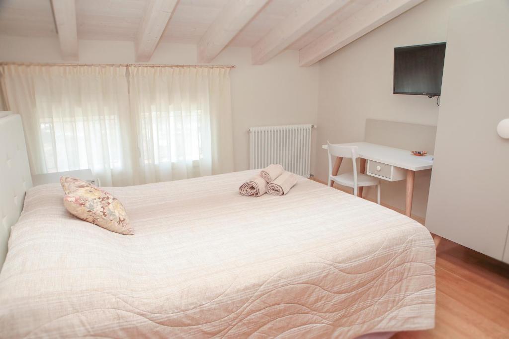 Postel nebo postele na pokoji v ubytování B&B ALLE SCALETTE