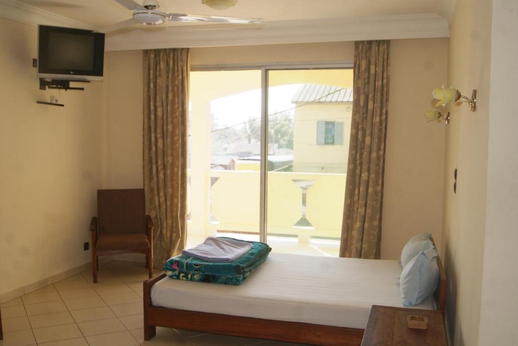 Postel nebo postele na pokoji v ubytování HOTEL MENABE