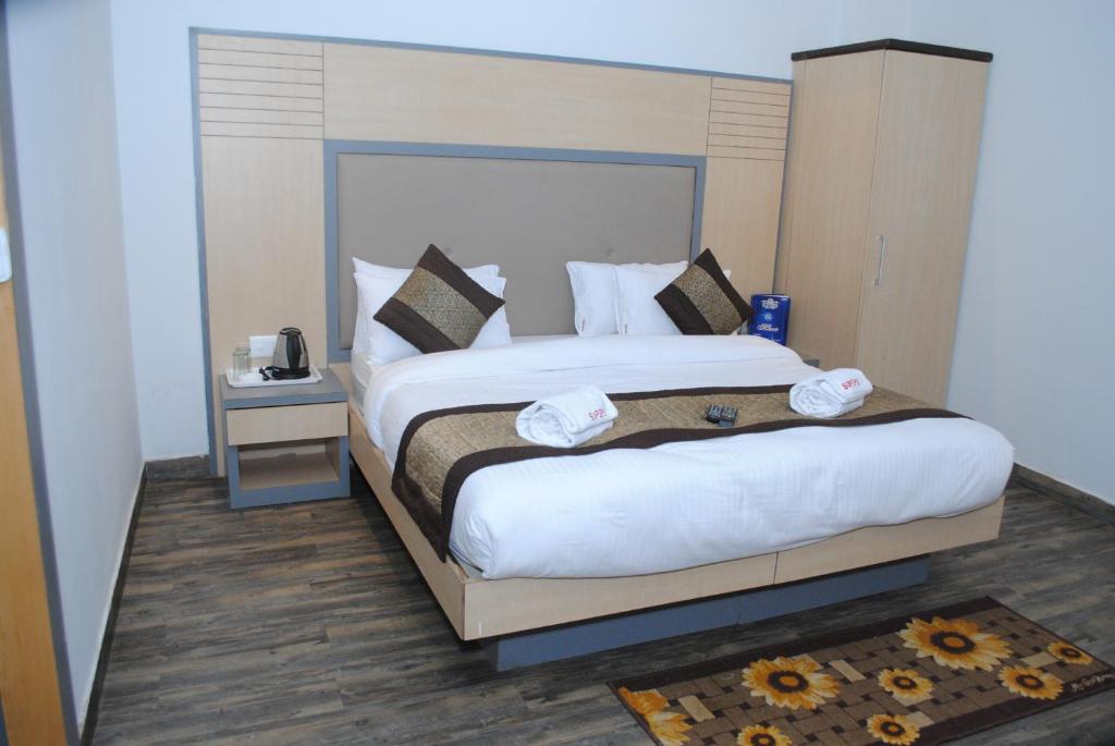 Postel nebo postele na pokoji v ubytování Hotel Superb 5 Mins Walk From New Delhi Station
