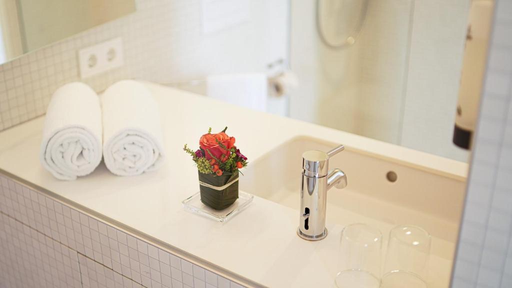 Koupelna v ubytování Hotel Bergamo