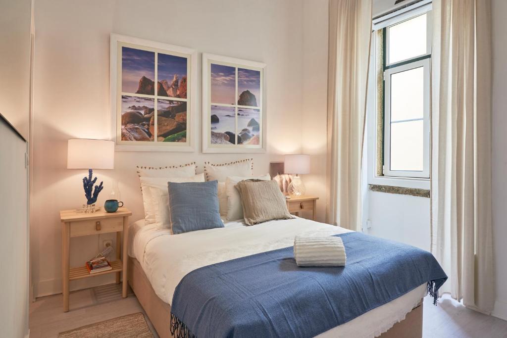 Postel nebo postele na pokoji v ubytování Praça da Figueira Elegance by MSapartments