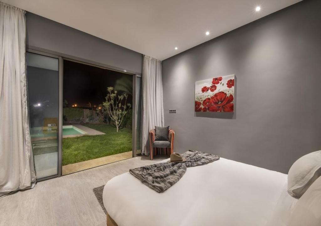 Bazén v ubytování Palms Edge Villas avec Piscine & Jardin Privés nebo v jeho okolí