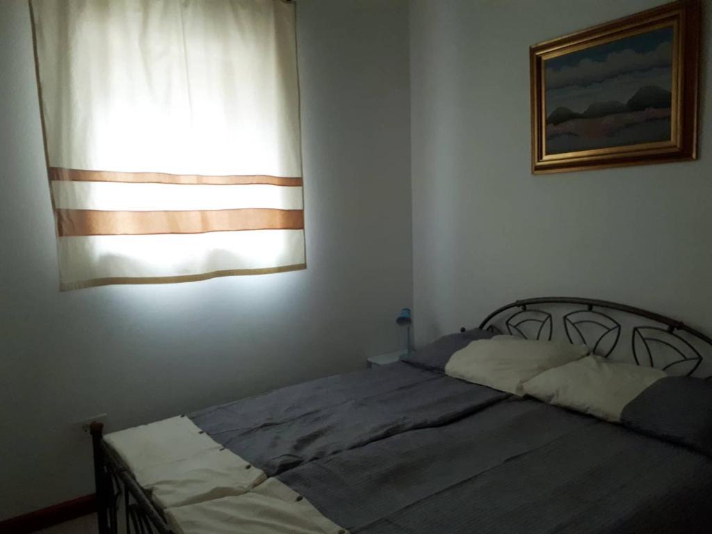 Łóżko lub łóżka w pokoju w obiekcie Villa Zen