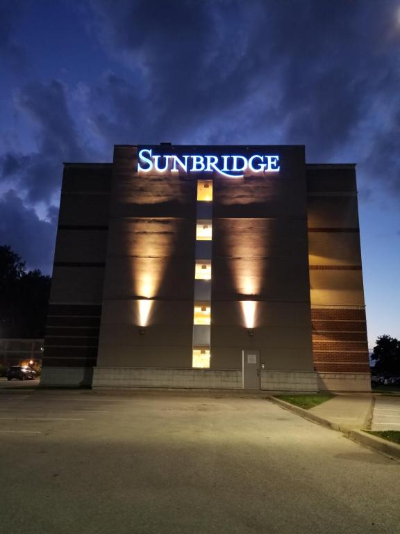 a sun cartridge building with a sign on it at Sunbridge Hotel & Conference Centre Sarnia in Sarnia