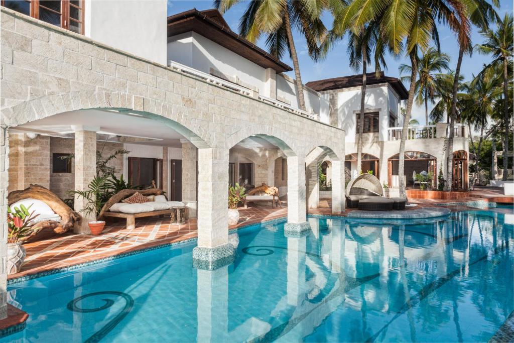 an image of a swimming pool in a house at The Maji Beach Boutique Hotel in Diani Beach