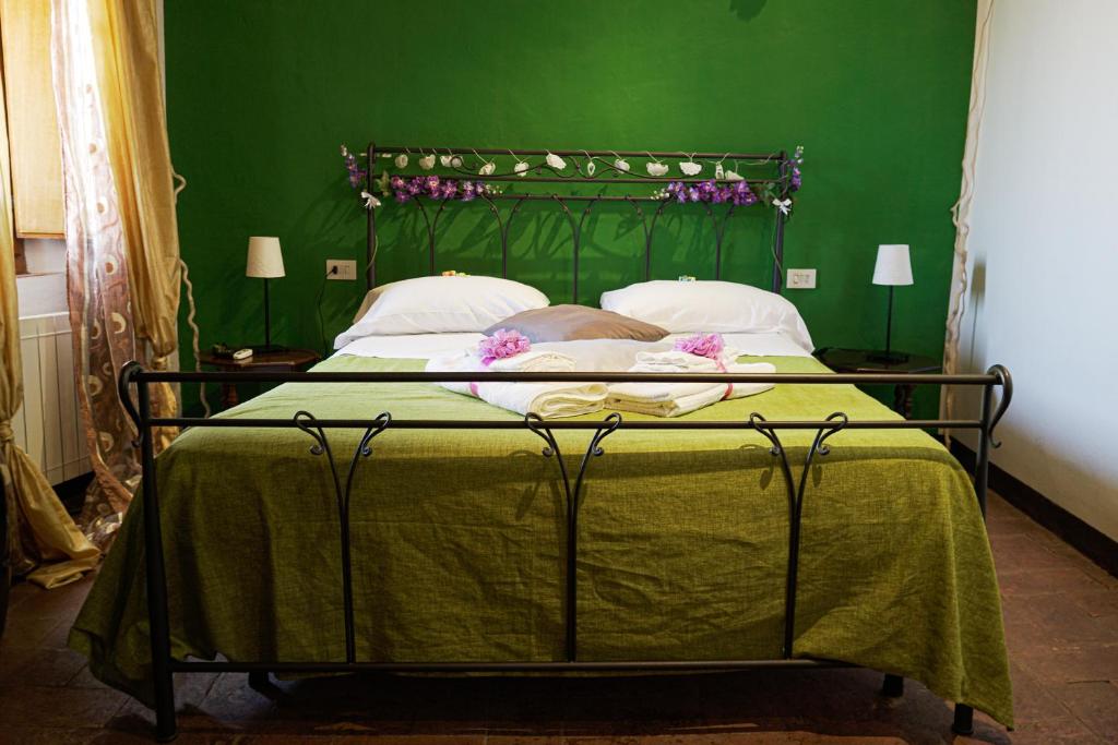 Postel nebo postele na pokoji v ubytování B&B Le Undici Lune