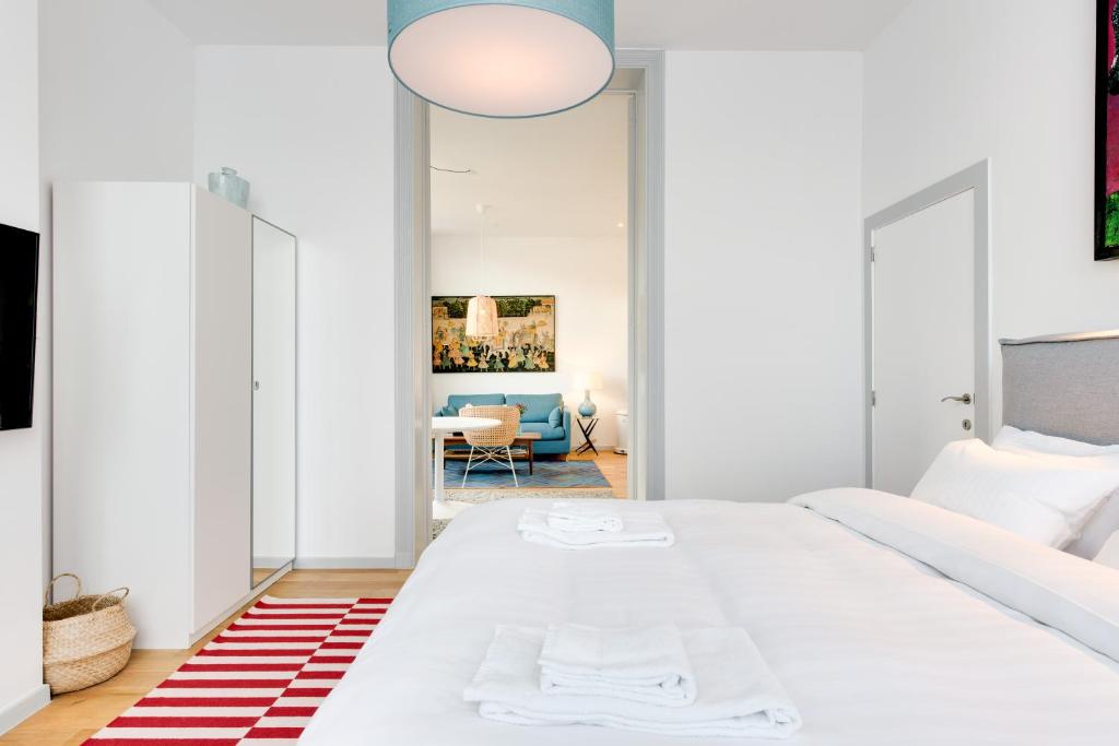 Een bed of bedden in een kamer bij Newton Boutique Hotel Residences - Brussels EU Area