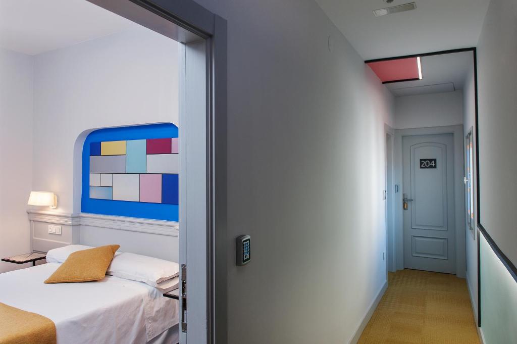 Posteľ alebo postele v izbe v ubytovaní Hotel Hito