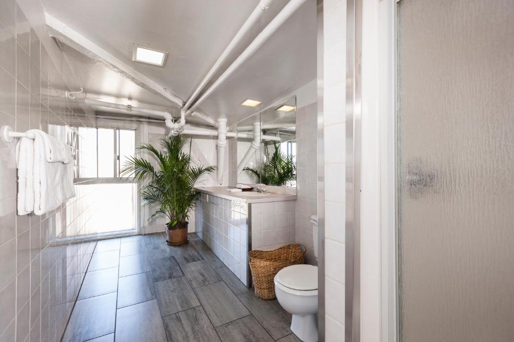 Koupelna v ubytování Hotel Abri du Voyageur