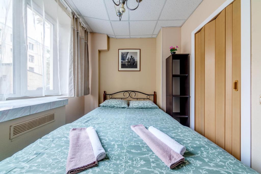 Кровать или кровати в номере Shabolovka Hotel