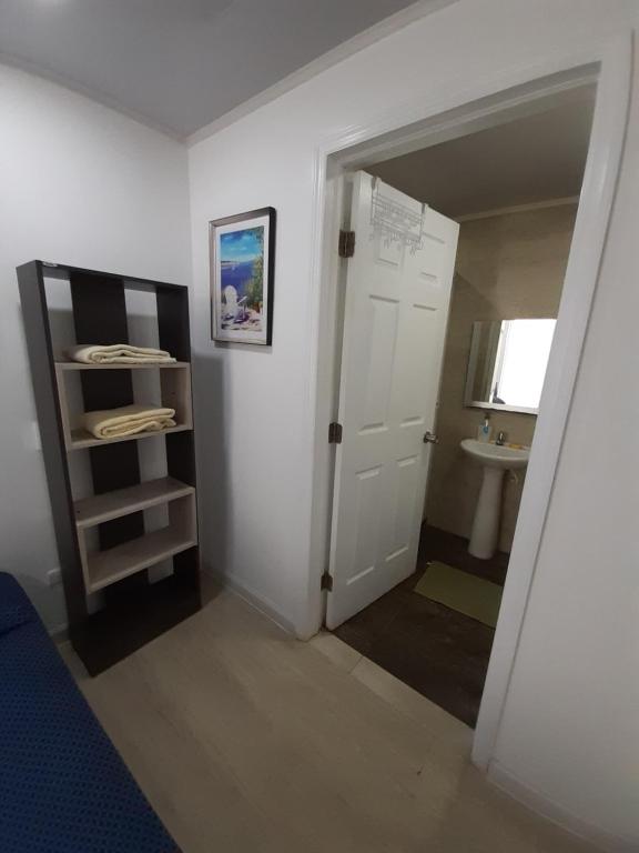 Postel nebo postele na pokoji v ubytování Palmare House