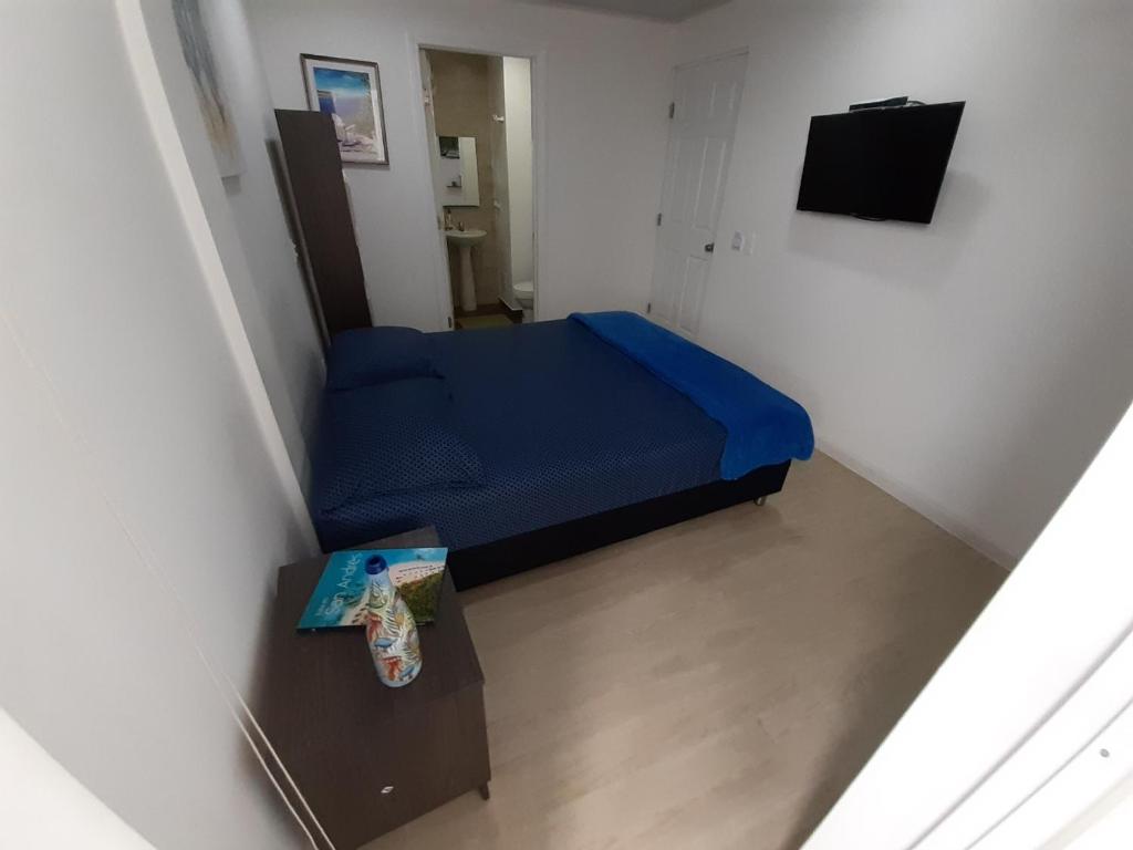 Postel nebo postele na pokoji v ubytování Palmare House