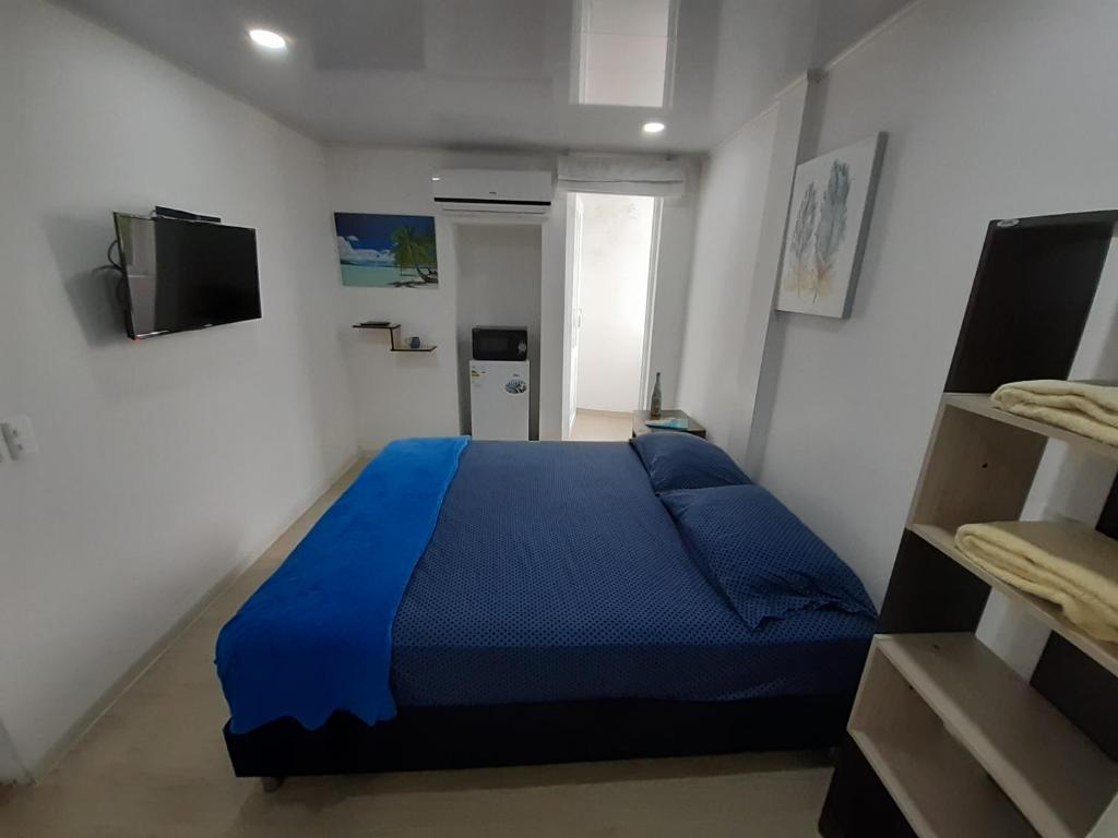Postel nebo postele na pokoji v ubytování Palmare House