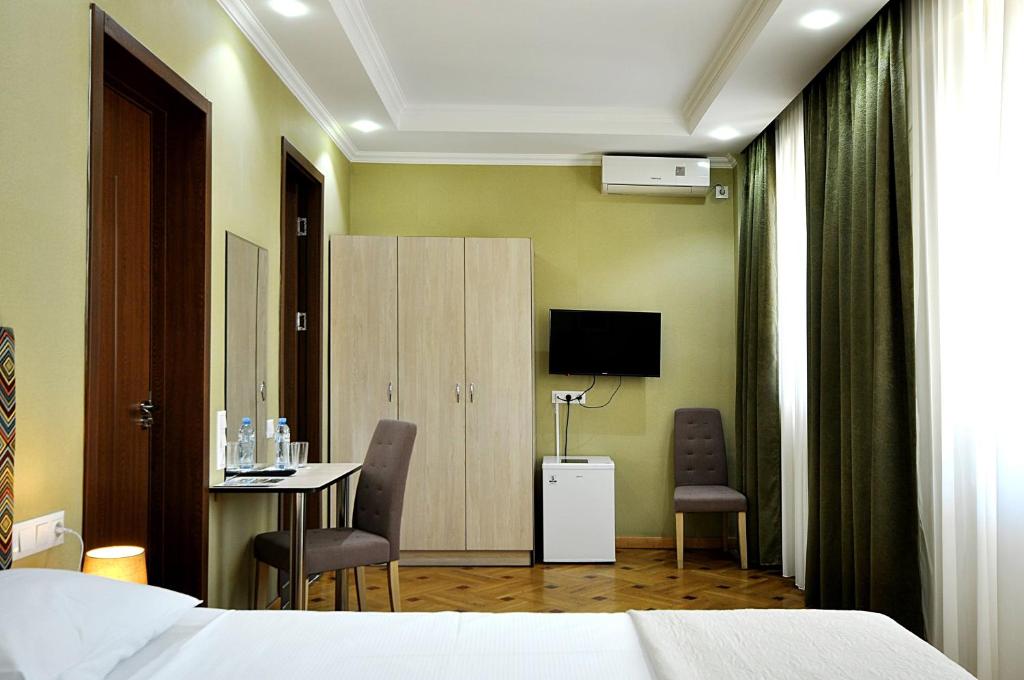 TV a/nebo společenská místnost v ubytování Hotel Frida