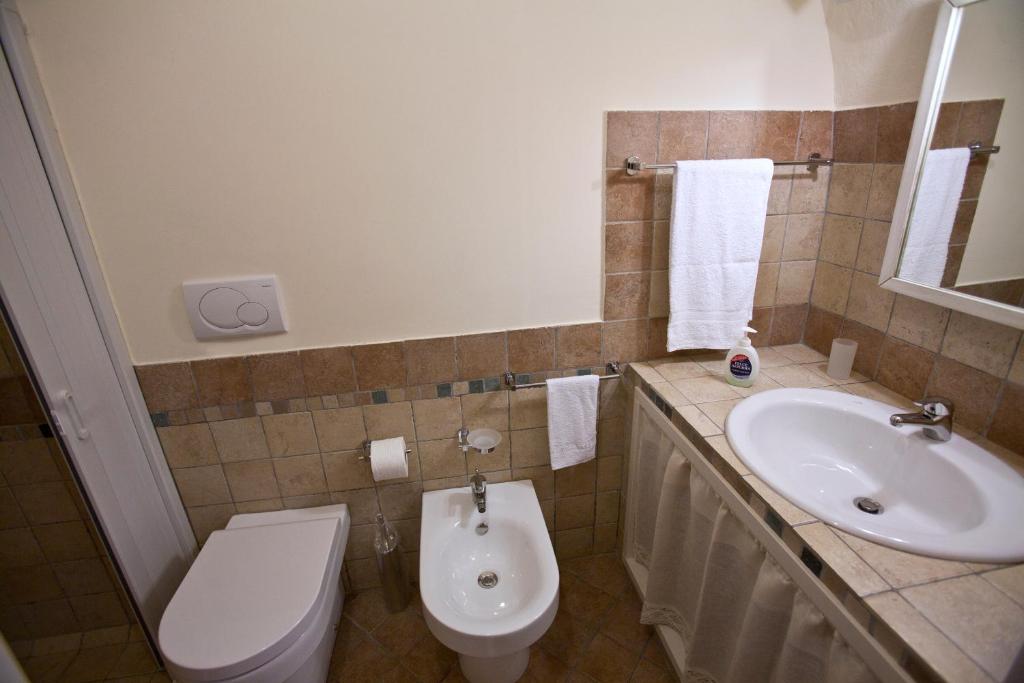 Koupelna v ubytování Residencefusaro appartamenti Specchia