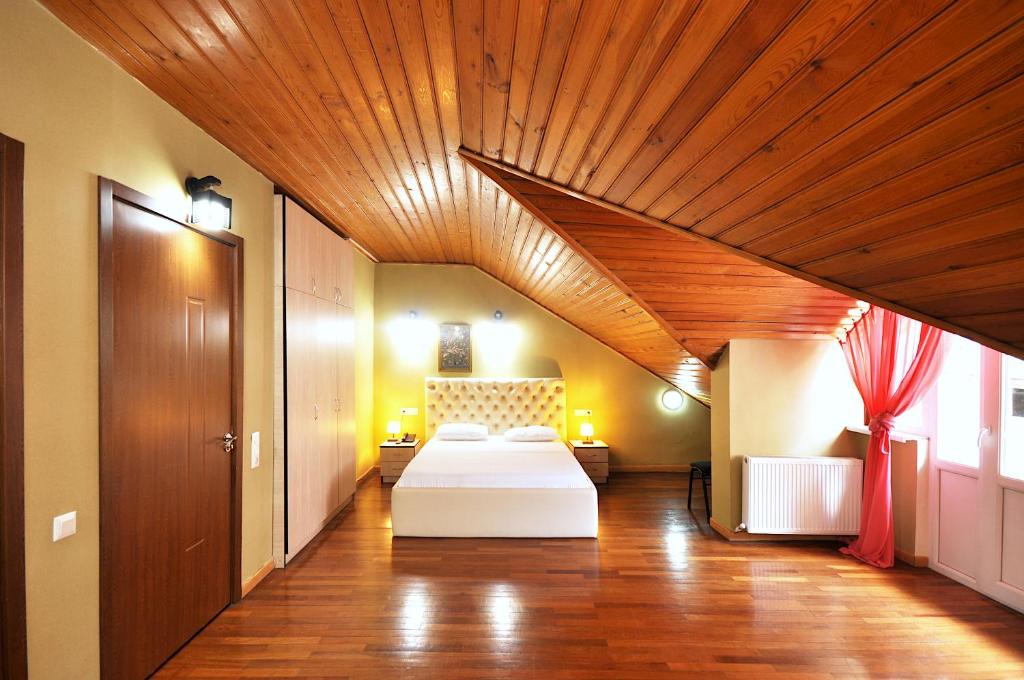 Postel nebo postele na pokoji v ubytování Hotel Frida