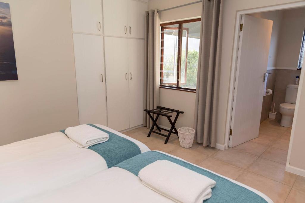 Letto o letti in una camera di Brenton Breakers