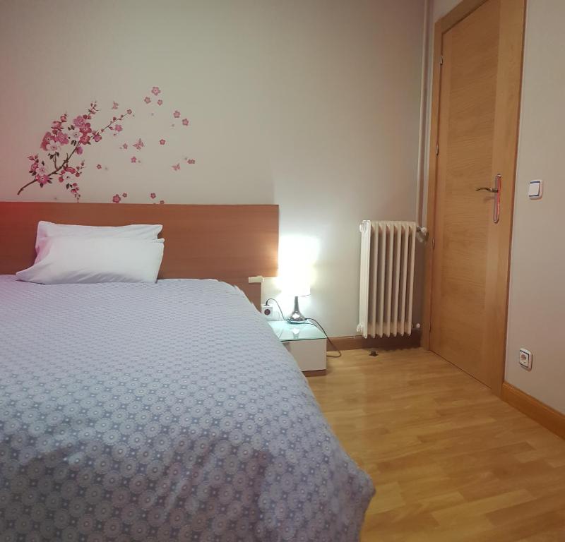 Posteľ alebo postele v izbe v ubytovaní www apartamentovaldivia es Parking incluido
