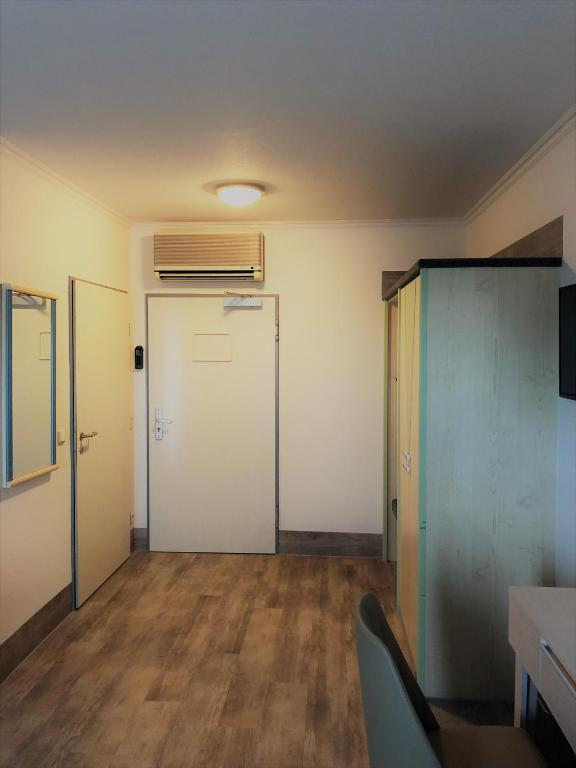TV a/nebo společenská místnost v ubytování A&M Hotel Barsinghausen