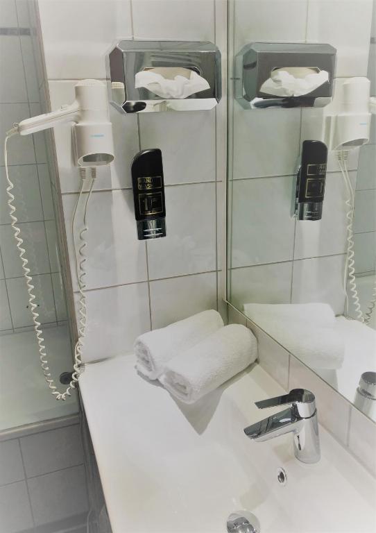 Koupelna v ubytování A&M Hotel Barsinghausen
