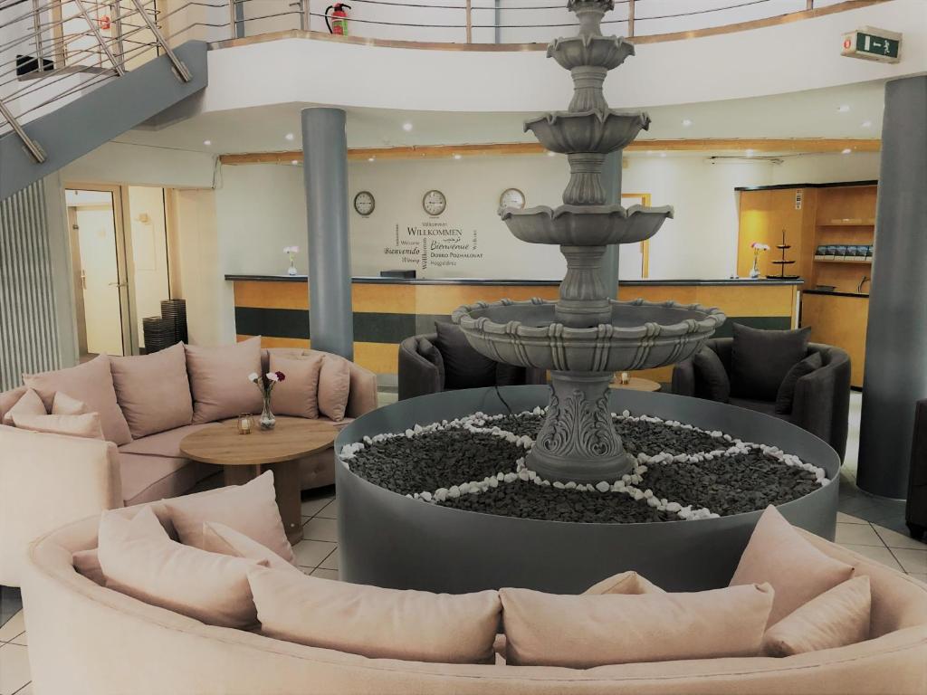 Posezení v ubytování A&M Hotel Barsinghausen