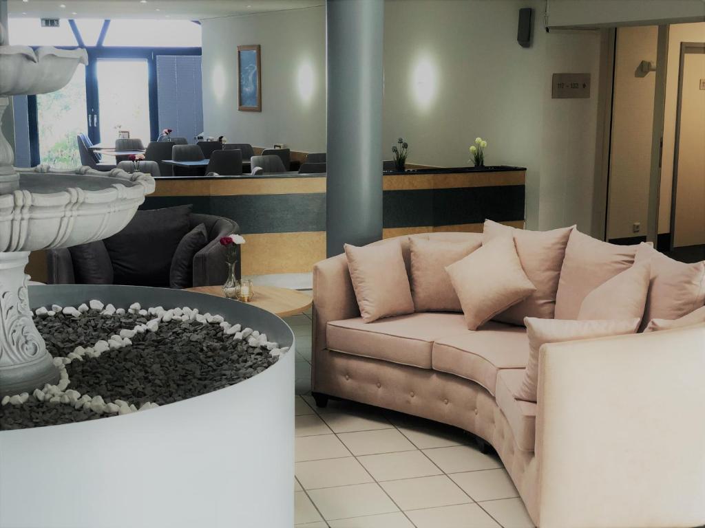 Posezení v ubytování A&M Hotel Barsinghausen