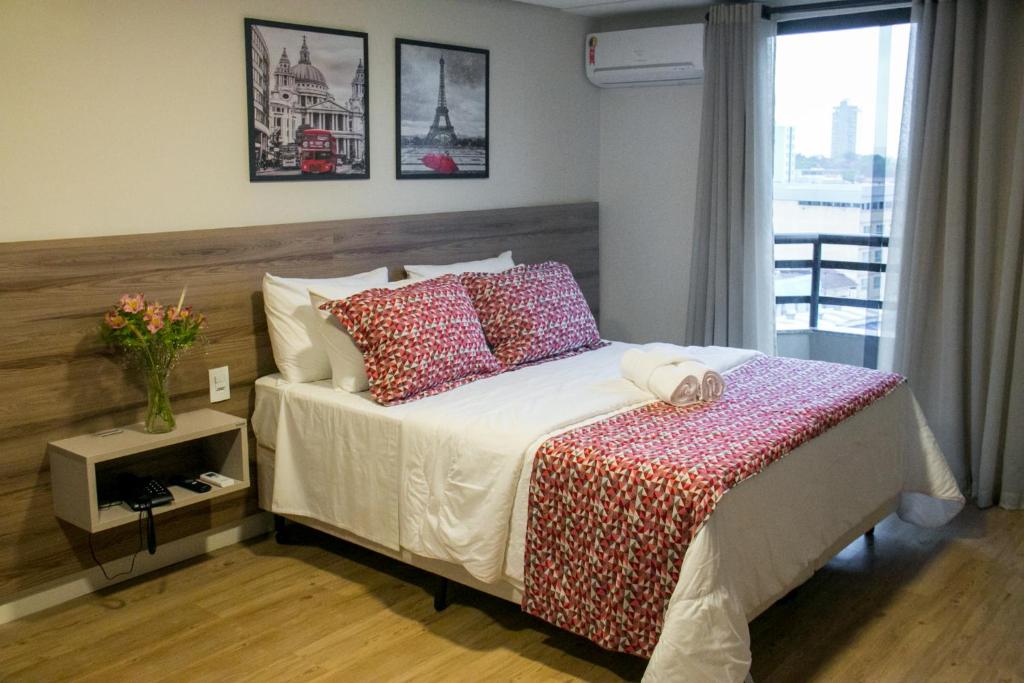 Postel nebo postele na pokoji v ubytování Hotel Ferraz