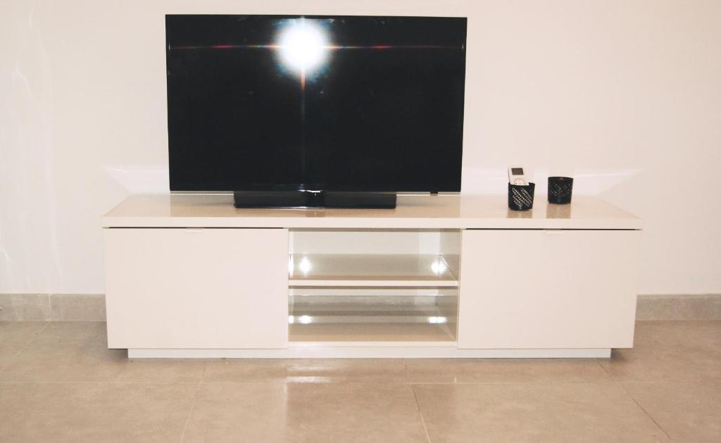 TV a/nebo společenská místnost v ubytování Apartamento El Andén de la Estación