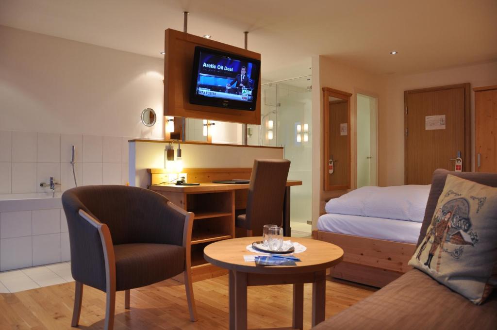 Posezení v ubytování Hotel Edelweiss Superior