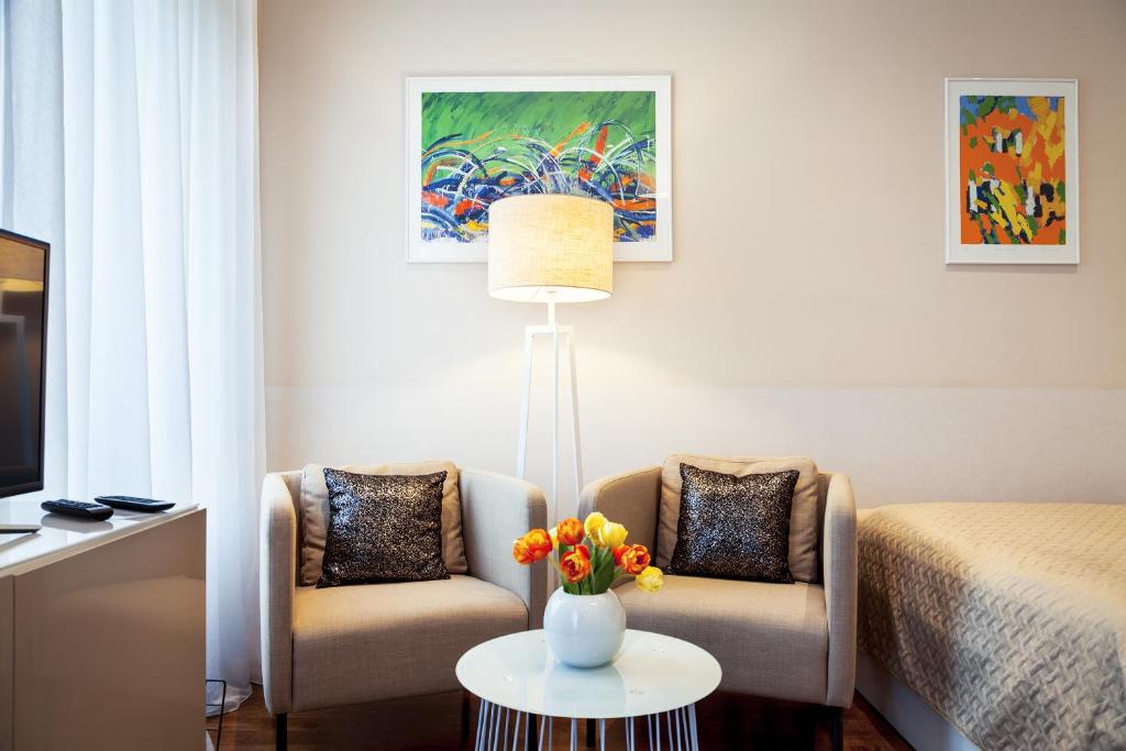 Televízia a/alebo spoločenská miestnosť v ubytovaní Markiz Luxury Apartments