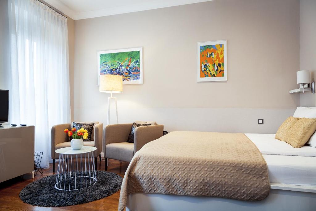 Televízia a/alebo spoločenská miestnosť v ubytovaní Markiz Luxury Apartments