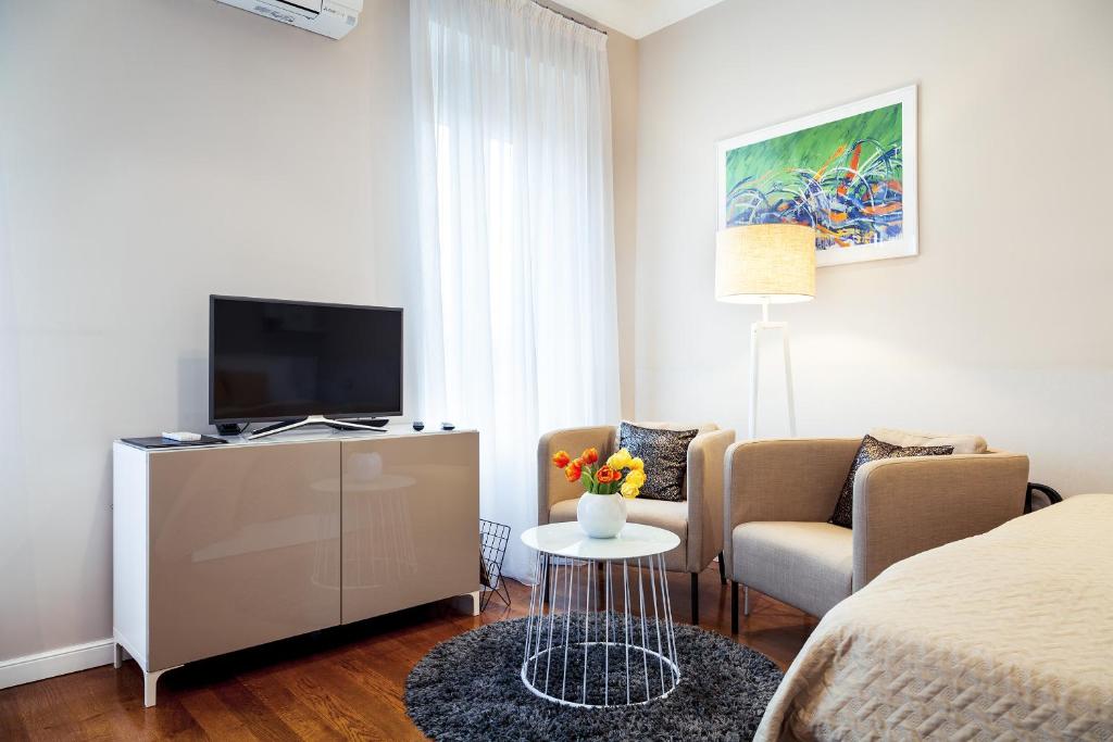 Televízia a/alebo spoločenská miestnosť v ubytovaní Markiz Luxury Apartments