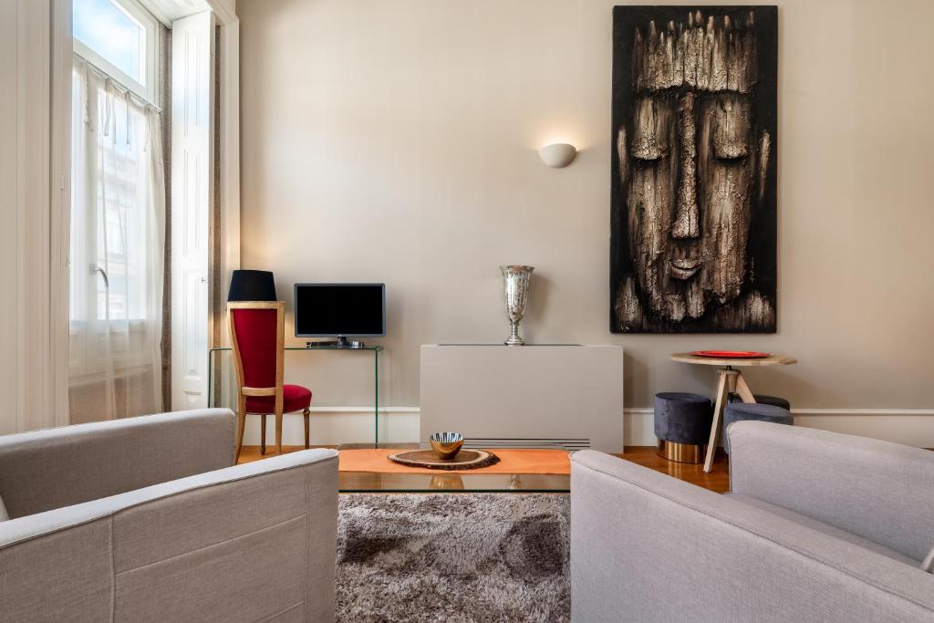 Uma TV ou centro de entretenimento em Maison Cabral