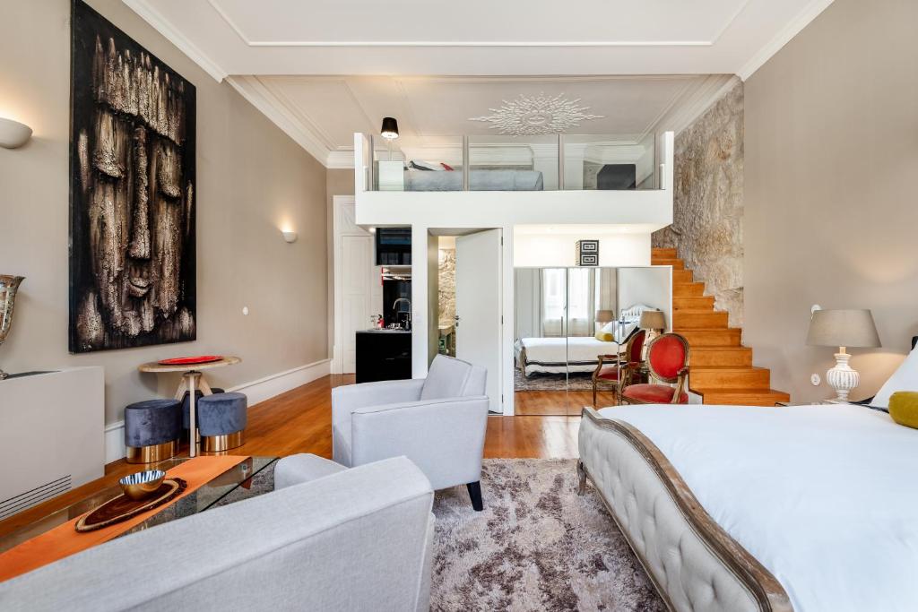 Cama ou camas em um quarto em Maison Cabral