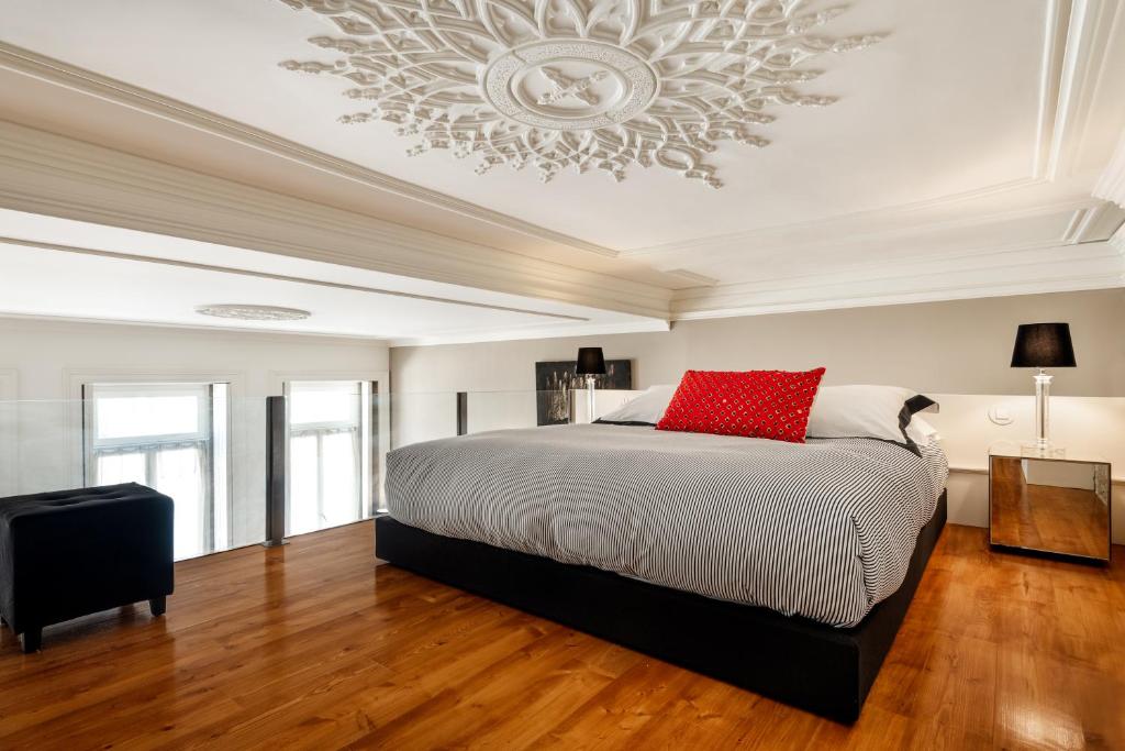 Cama ou camas em um quarto em Maison Cabral
