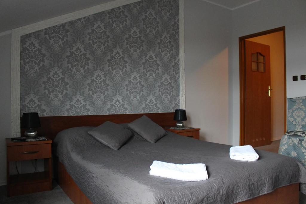 Posteľ alebo postele v izbe v ubytovaní Restauracja Hotel Kassandra