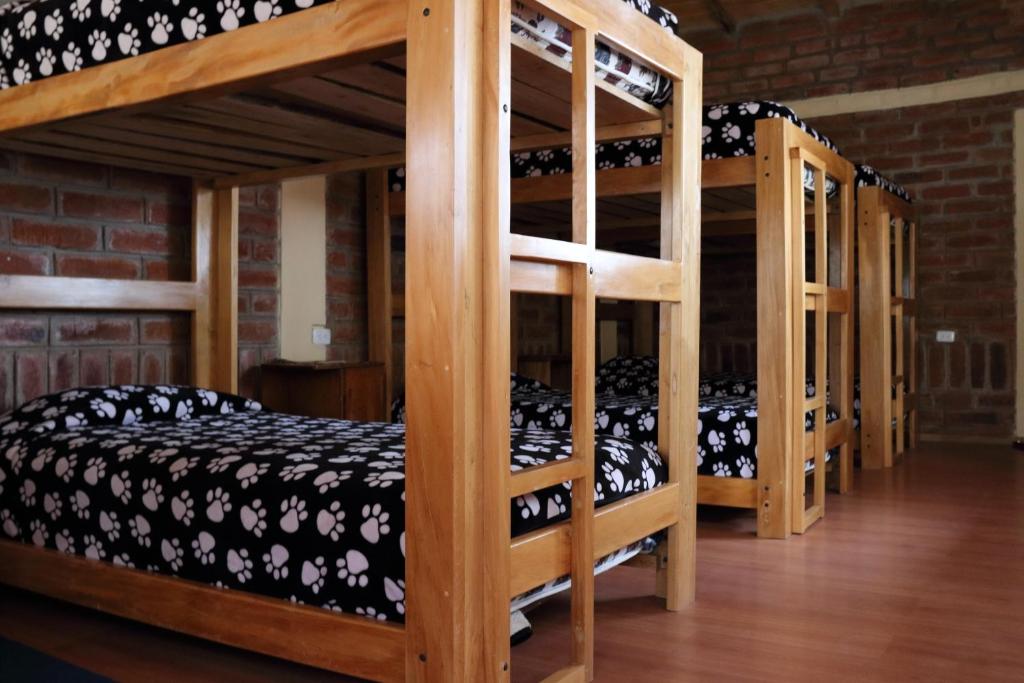 Postel nebo postele na pokoji v ubytování Hostal el Vaquero