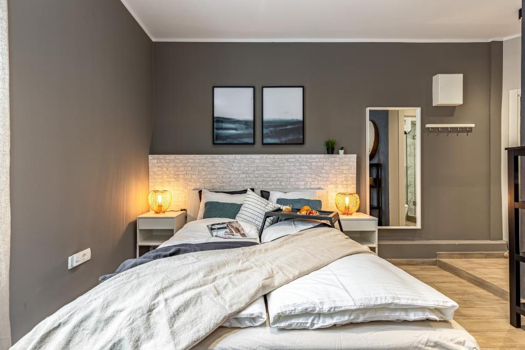 Posteľ alebo postele v izbe v ubytovaní Number 1 Apartments Rijeka