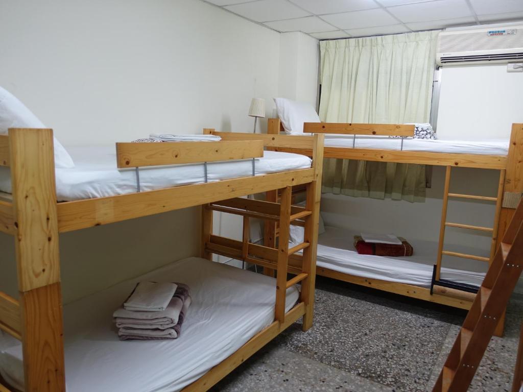 Postel nebo postele na pokoji v ubytování Kite Hostel