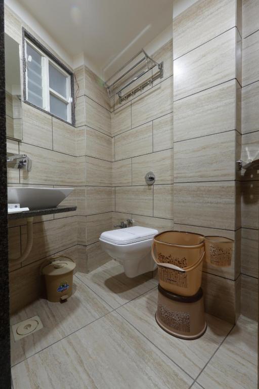 Koupelna v ubytování Hotel Alka Inn