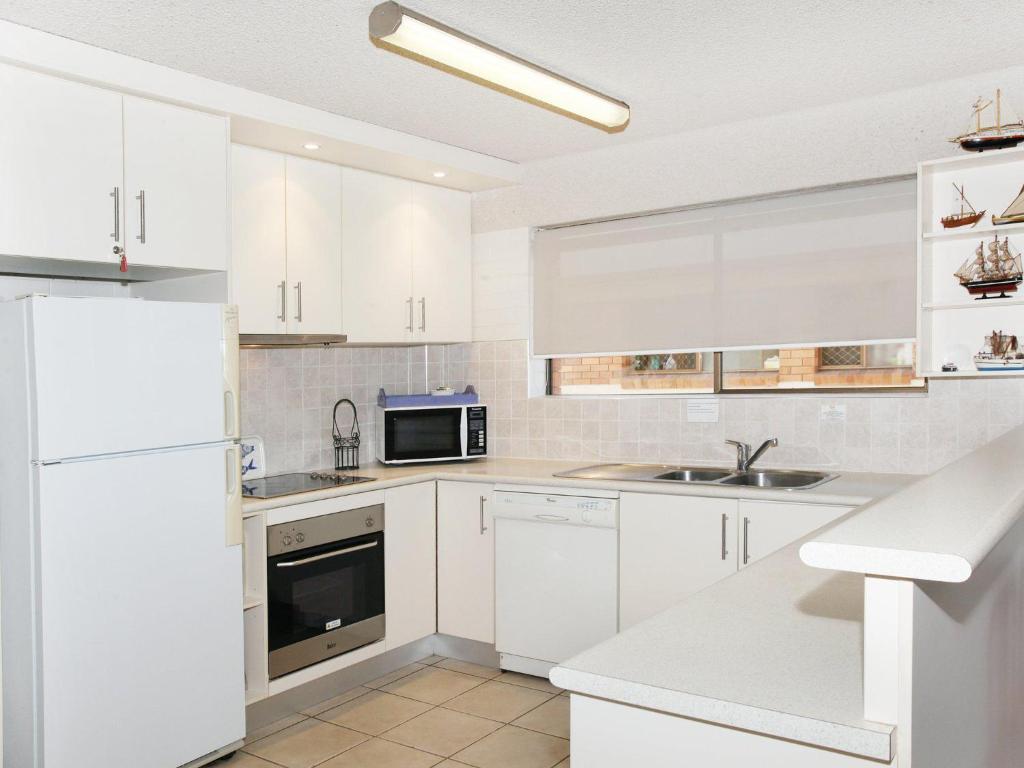 Kuchyň nebo kuchyňský kout v ubytování Riverview II 3